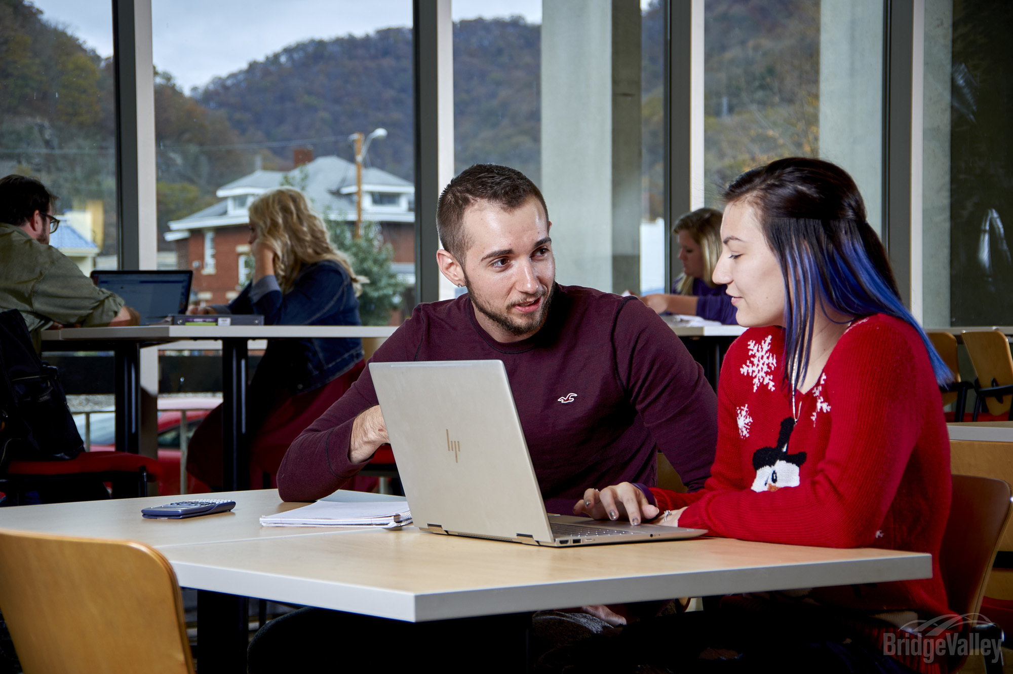 Students sitting at desk.