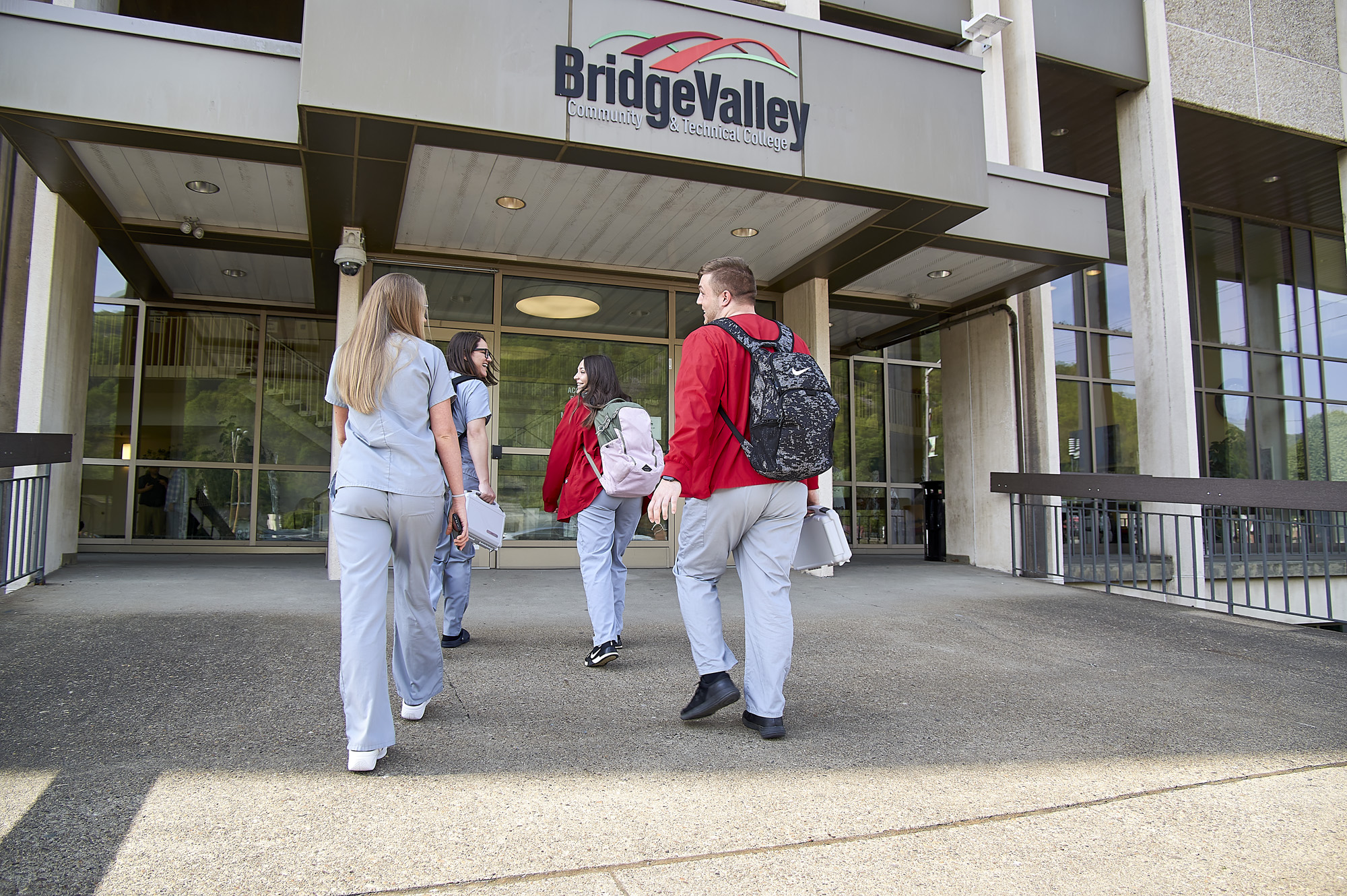 Students entering building.