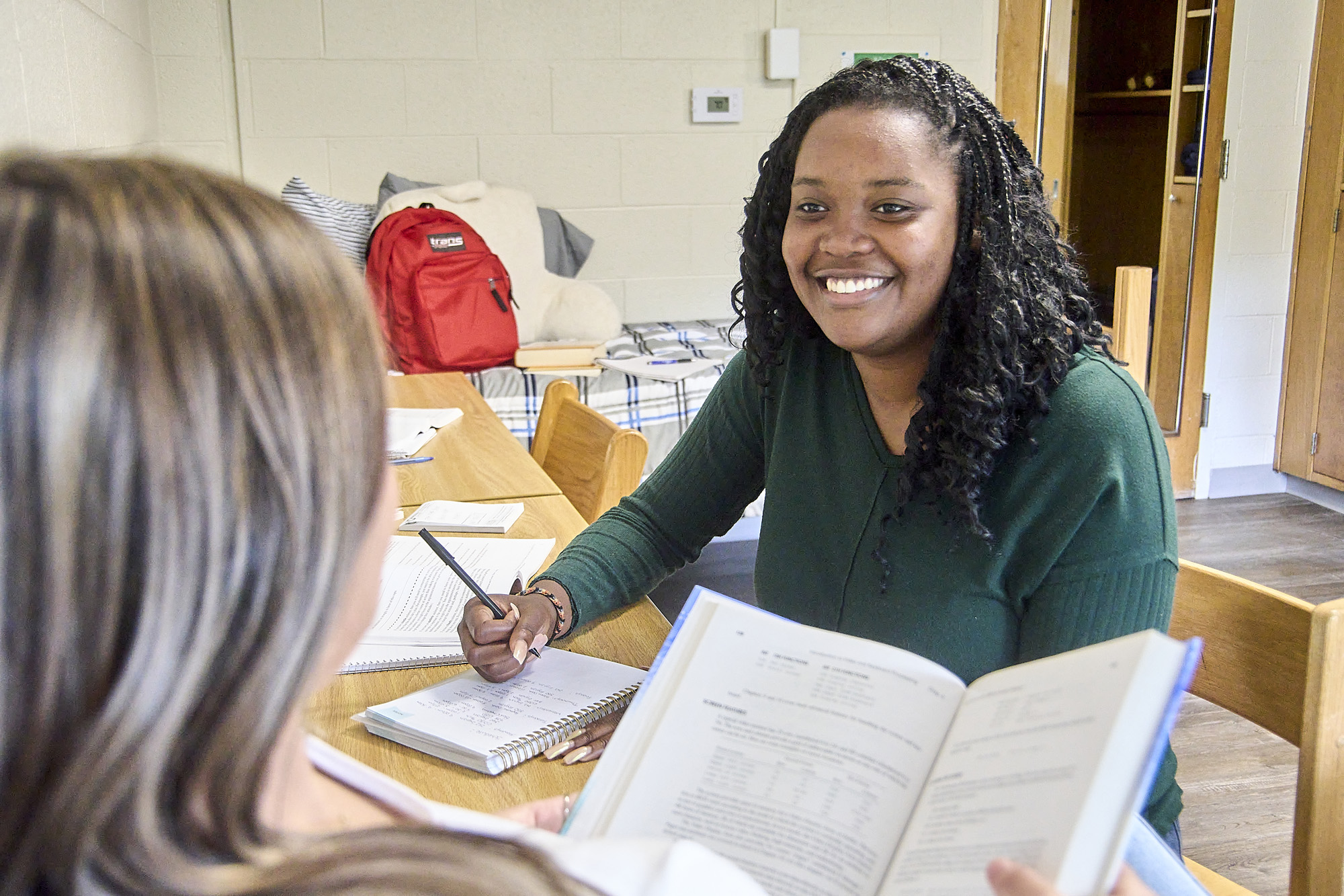 Students sitting at desk.