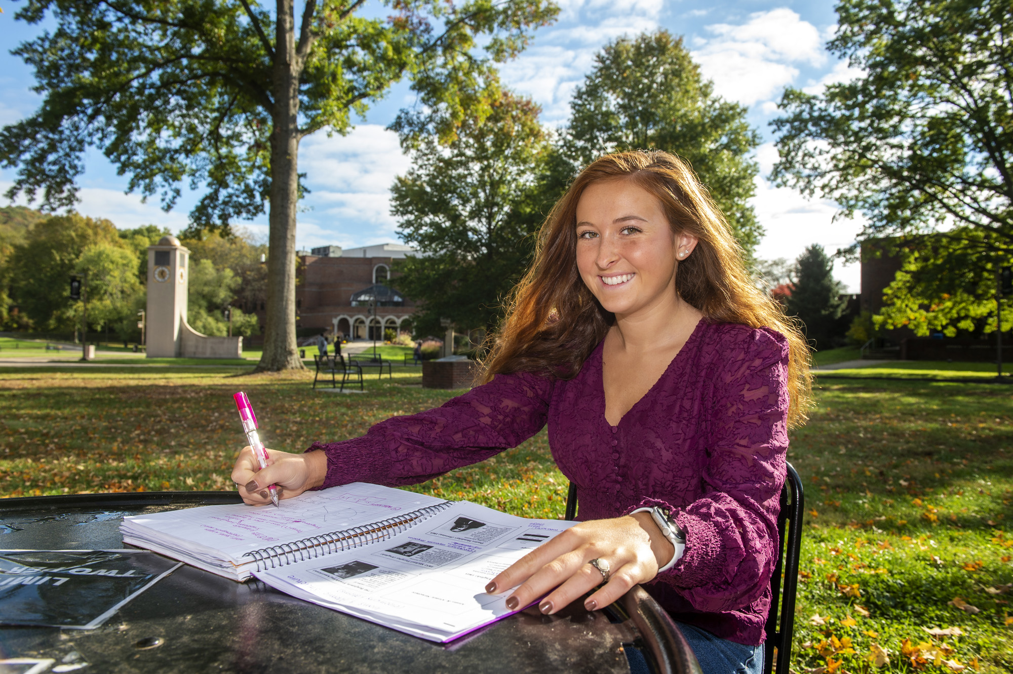 Student sitting outside.
