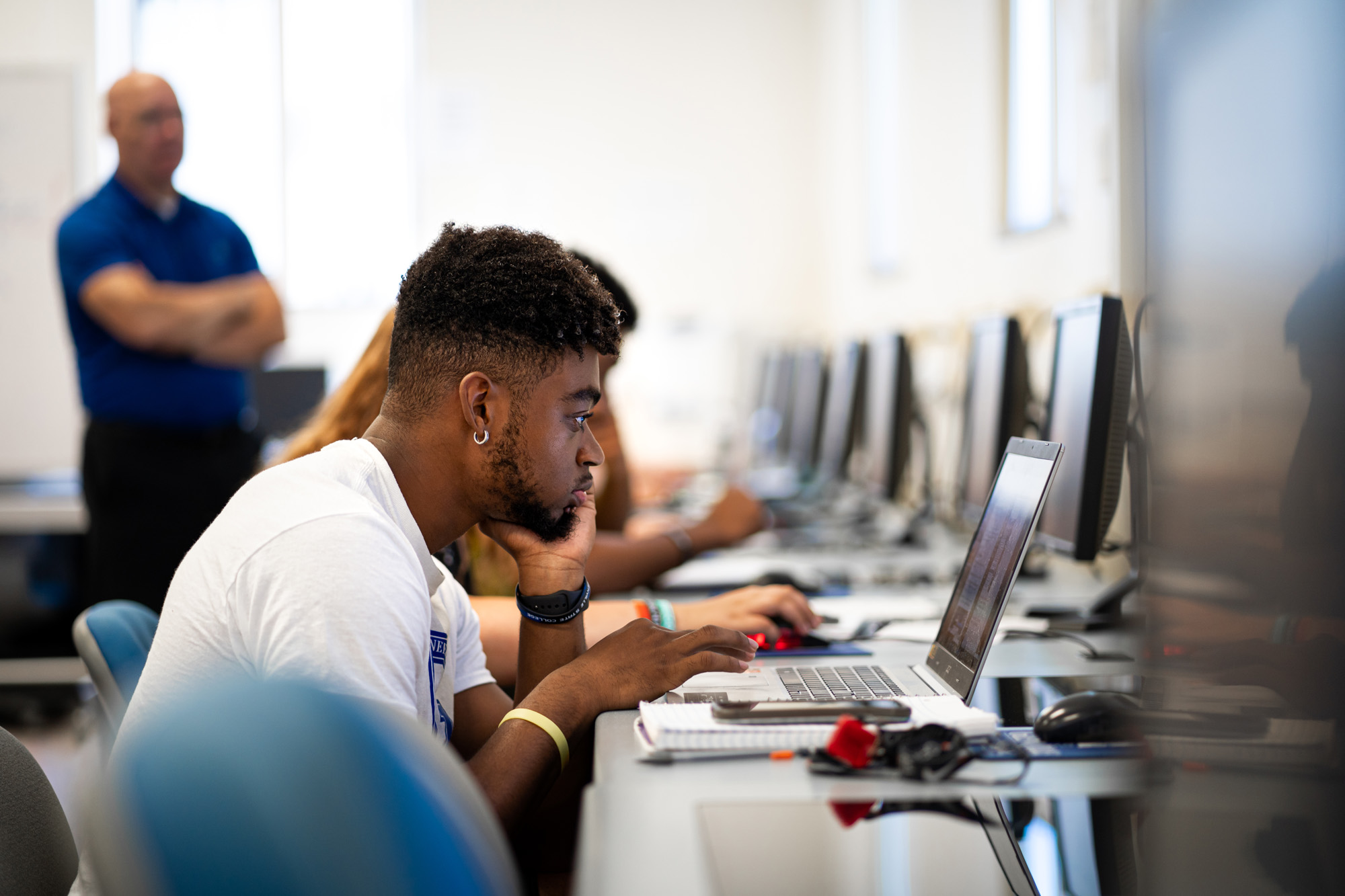 Students sitting at computers.