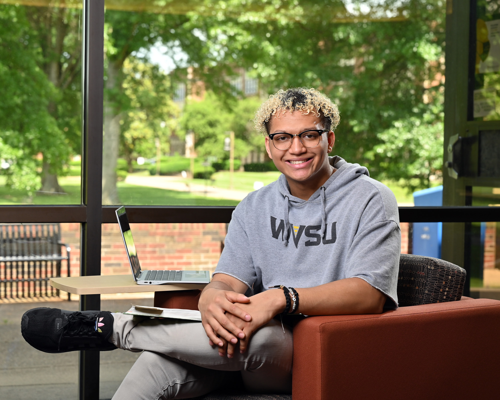 Student in college building.